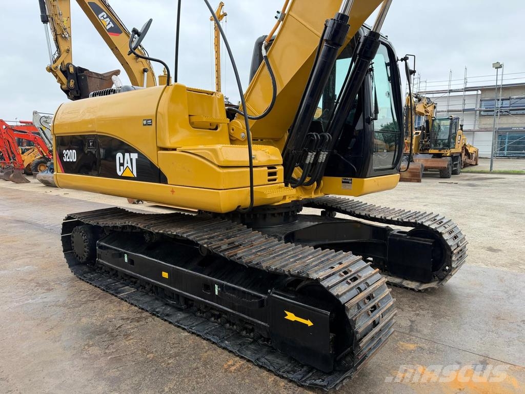 CAT 320 DL . Raupenbagger