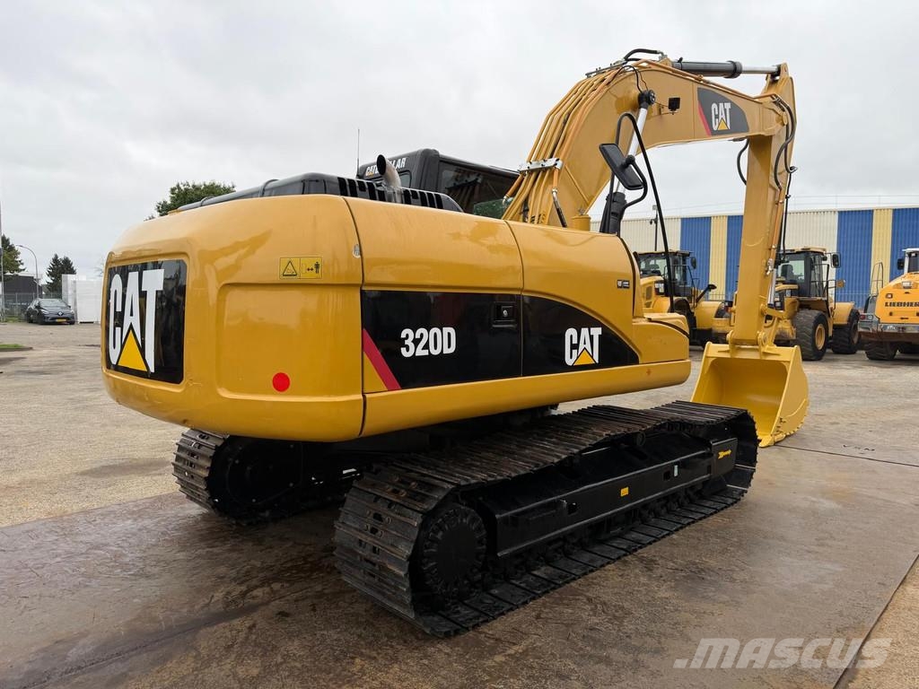 CAT 320 DL . Raupenbagger