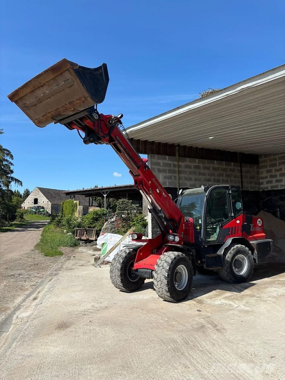 Schäffer T6680 Ön yükleyici ve kazicilar
