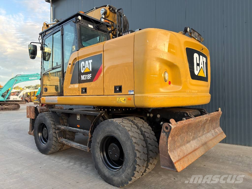CAT M318F Excavatoare cu roti