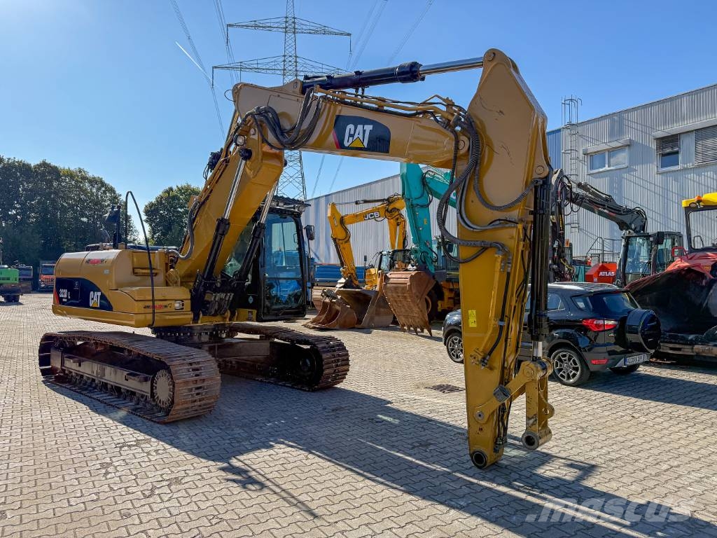 CAT 323 D Verstellausleger Klimaauto. Telakaivukoneet