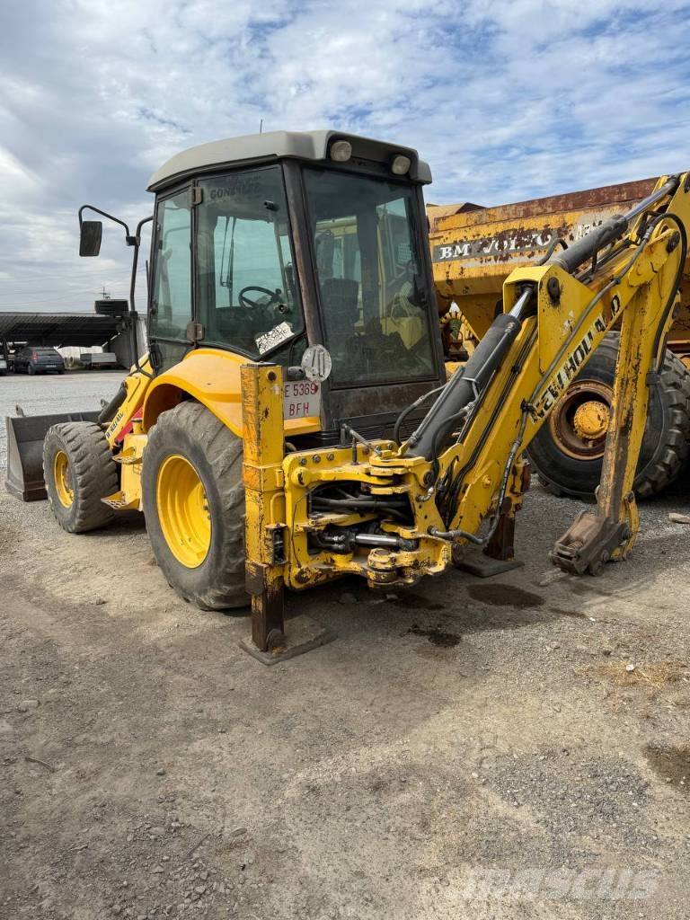 New Holland LB 110 B-4 PT لوادر ذات جرافات عكسية