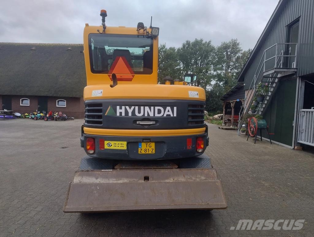 Hyundai ROBEX 55W-9A Banden kraan Ekskavatori uz riteņiem