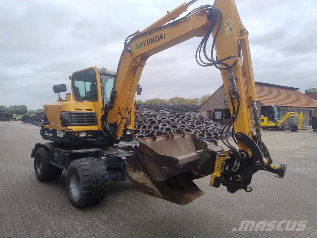 Hyundai ROBEX 55W-9A Banden kraan Ekskavatori uz riteņiem