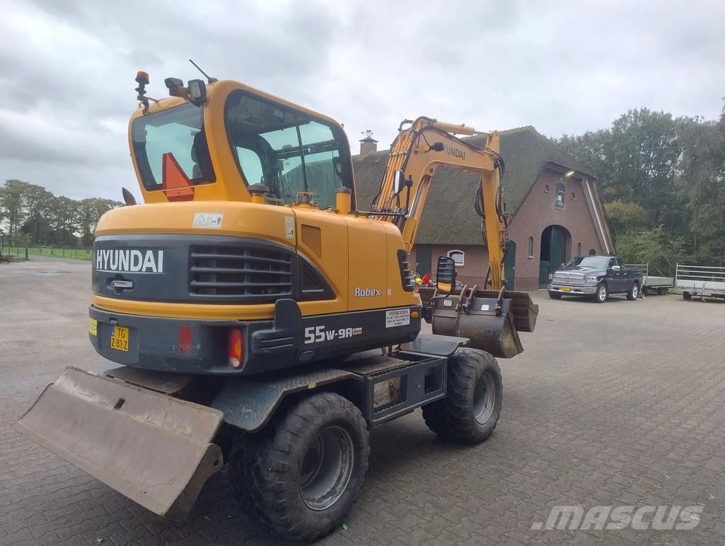 Hyundai ROBEX 55W-9A Banden kraan Ekskavatori uz riteņiem