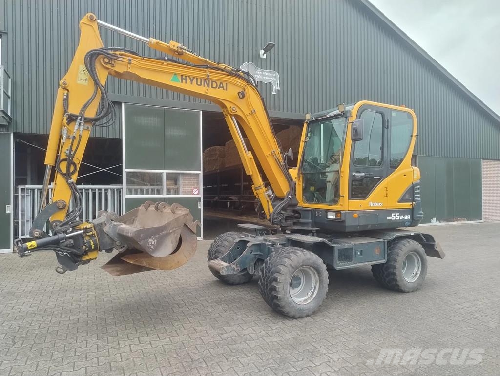 Hyundai ROBEX 55W-9A Banden kraan Ekskavatori uz riteņiem