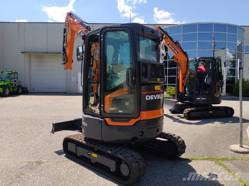 Develon DX 27 Z-7 Minigraafmachines < 7t