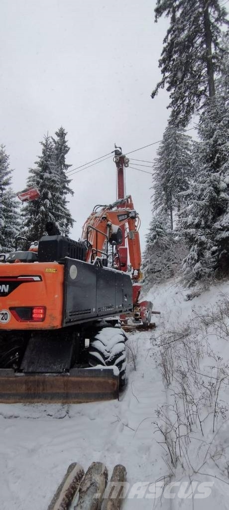 Develon DX210W-7 mit Konrad Woody 60-1 Seilwinde Harwestery