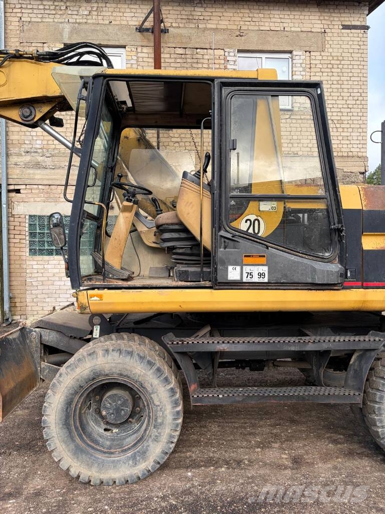 CAT M 315 Bagri na kolesih