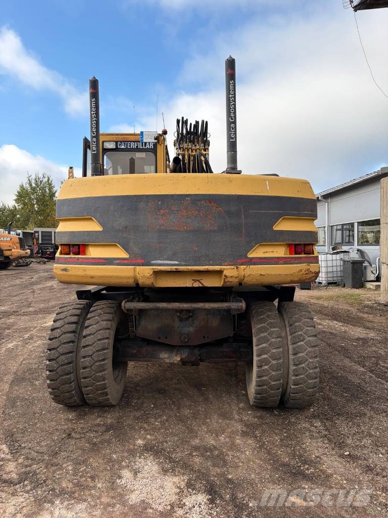 CAT M 315 Bagri na kolesih