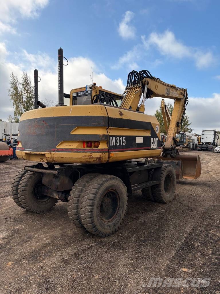 CAT M 315 Bagri na kolesih