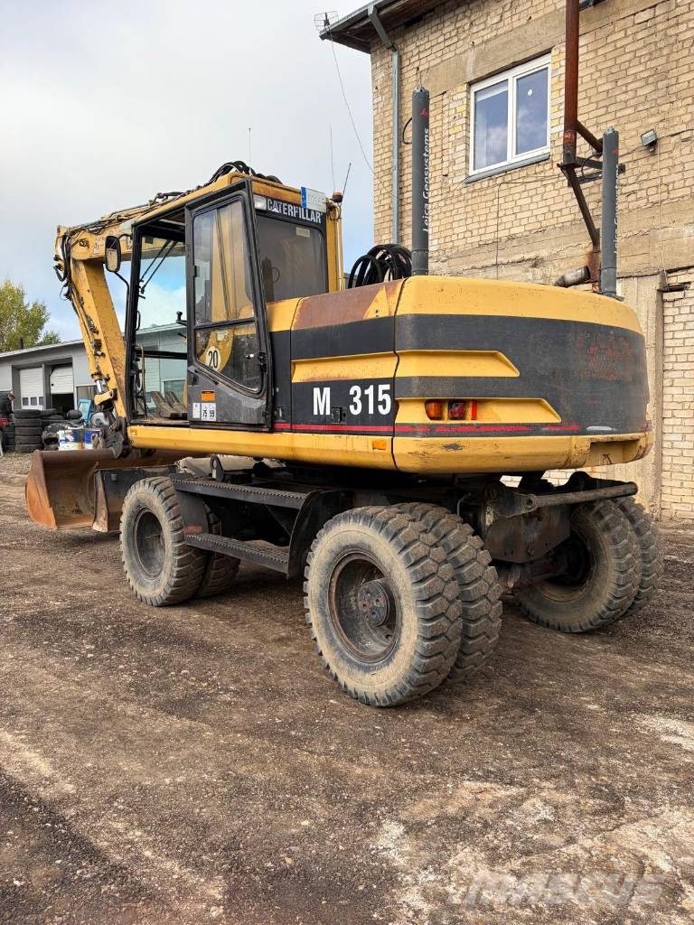 CAT M 315 Bagri na kolesih