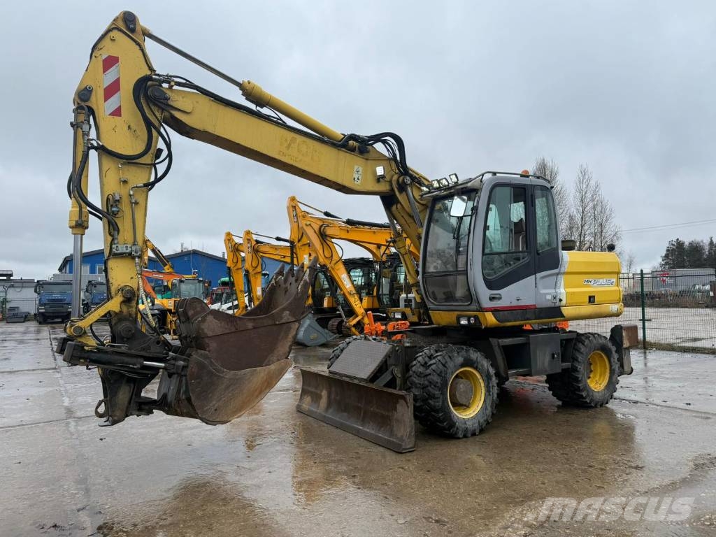 New Holland MH Plus C Wielgraafmachines