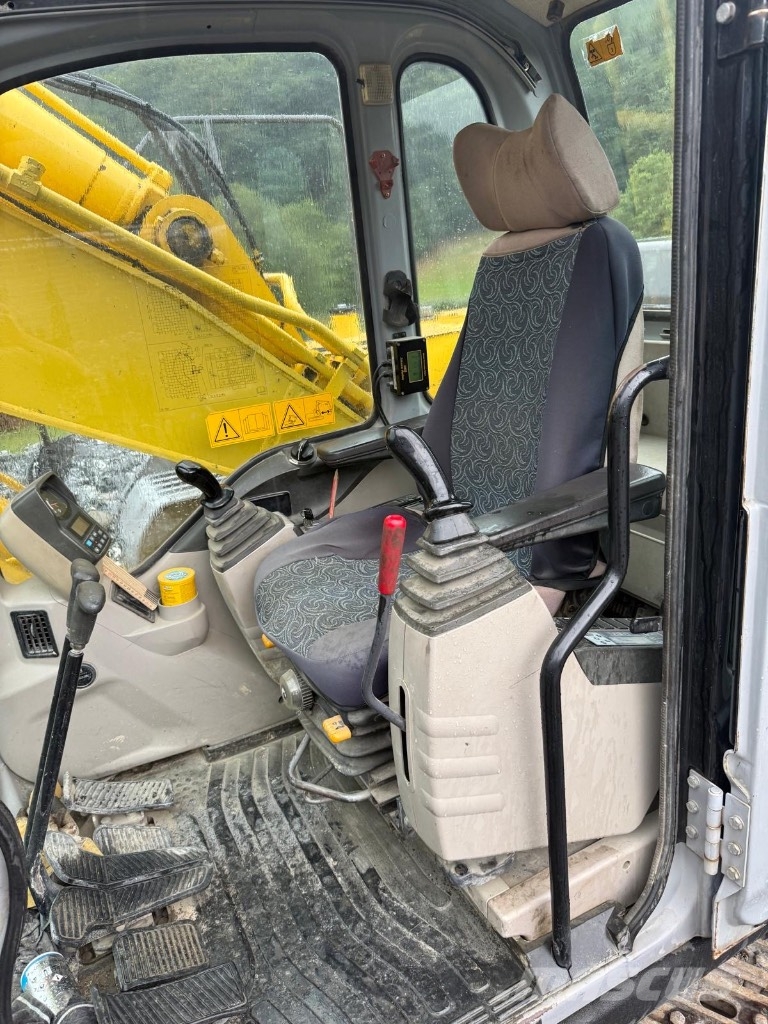 New Holland E 245 Gravemaskiner på larvebånd