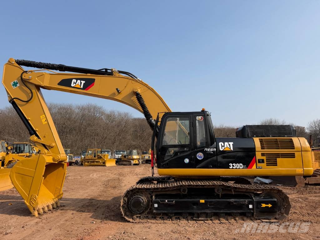 CAT 330DL Гусеничні екскаватори