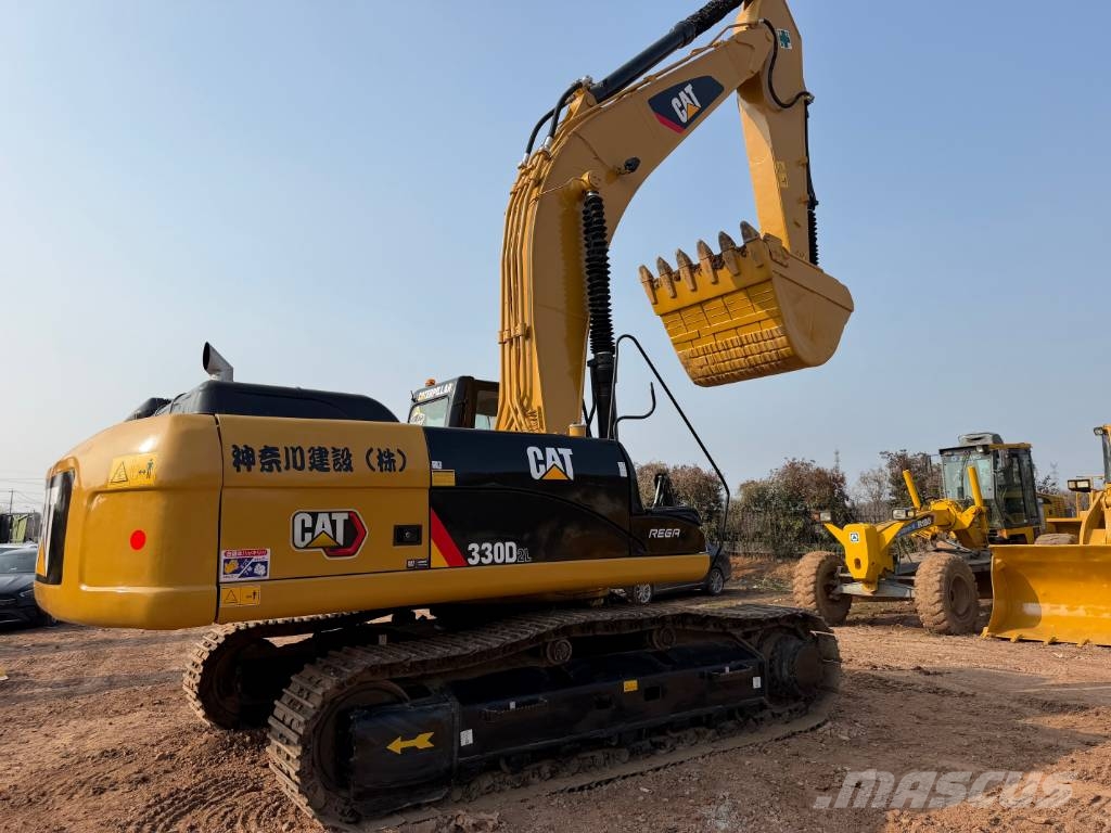 CAT 330DL Гусеничні екскаватори