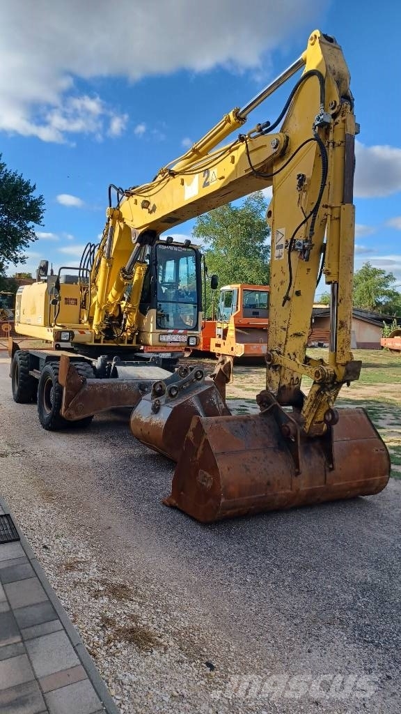 Komatsu PW 220-7 حفارات بعجل