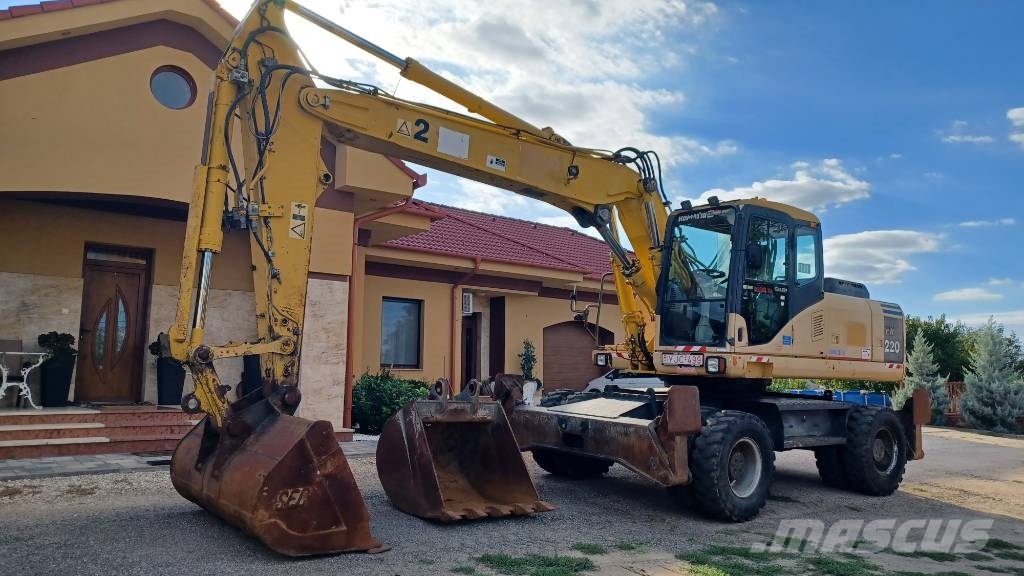 Komatsu PW 220-7 حفارات بعجل