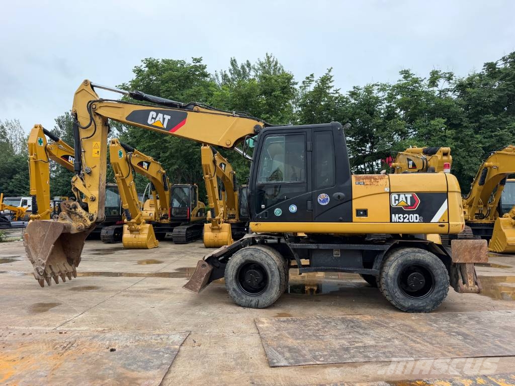 CAT M320D Bagri na kolesih