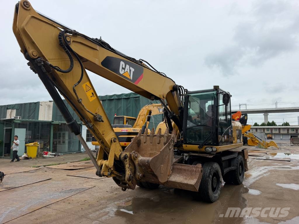 CAT M320D Bagri na kolesih