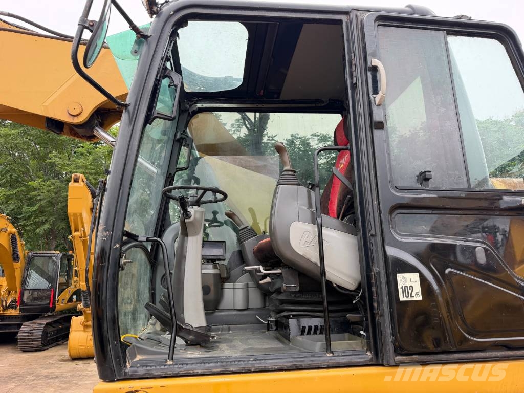 CAT M320D Bagri na kolesih