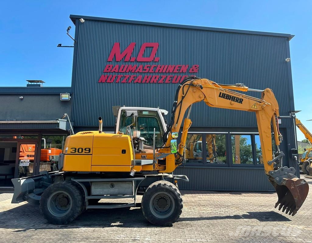 Liebherr A309 Litronic Εκσκαφείς με τροχούς - λάστιχα