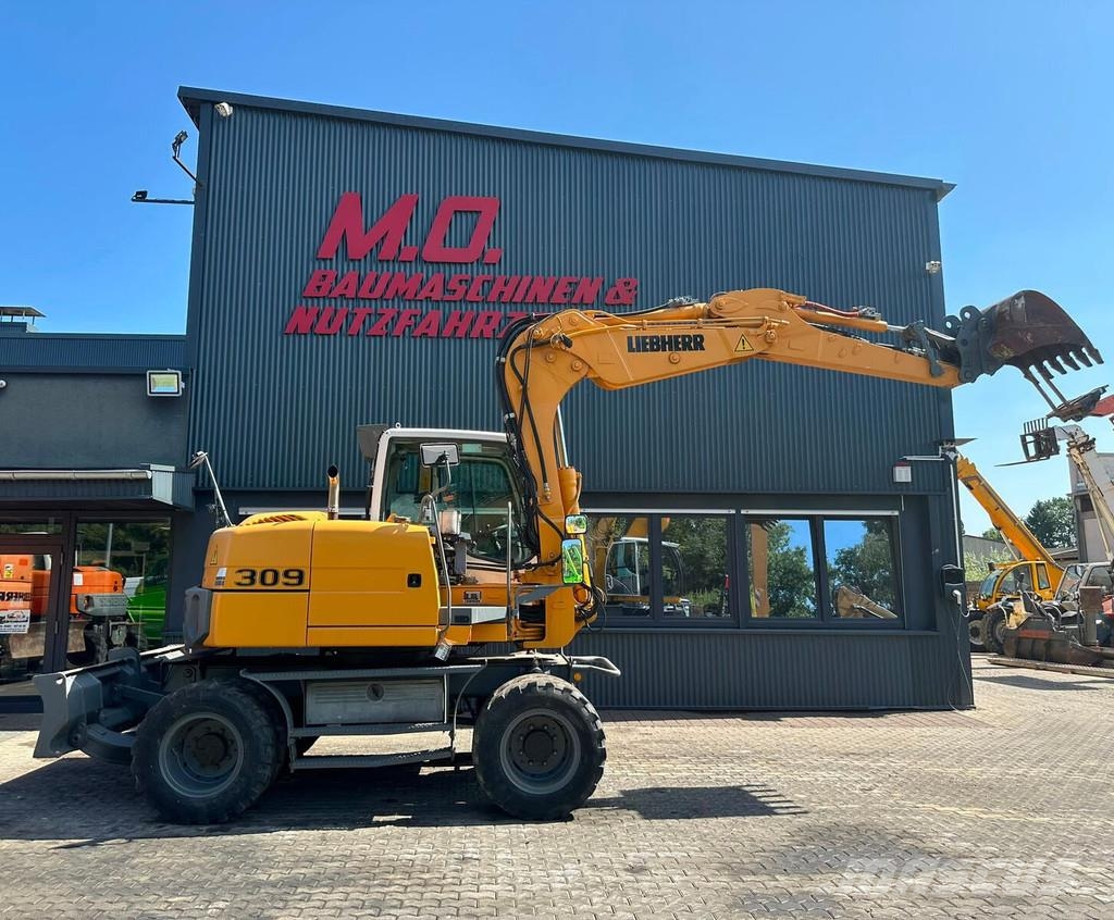 Liebherr A309 Litronic Εκσκαφείς με τροχούς - λάστιχα