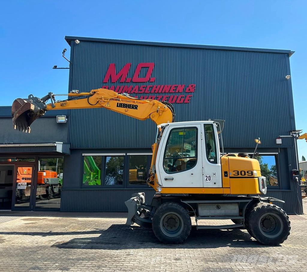 Liebherr A309 Litronic Εκσκαφείς με τροχούς - λάστιχα