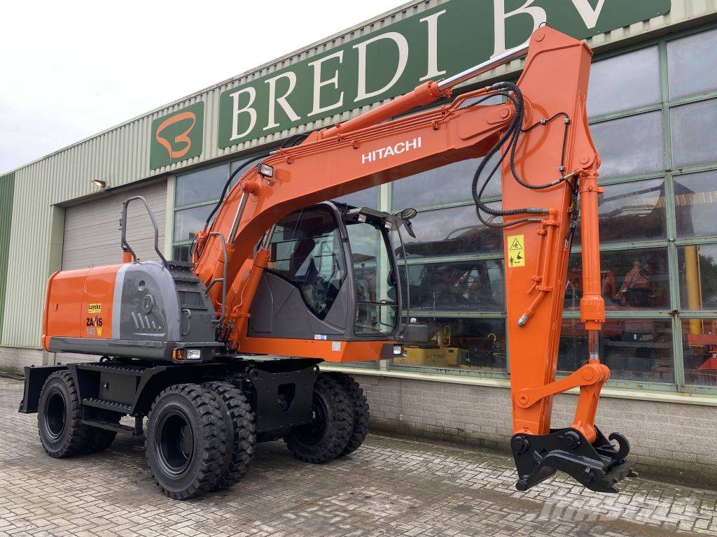 Hitachi ZX 140 W-3 حفارات بعجل
