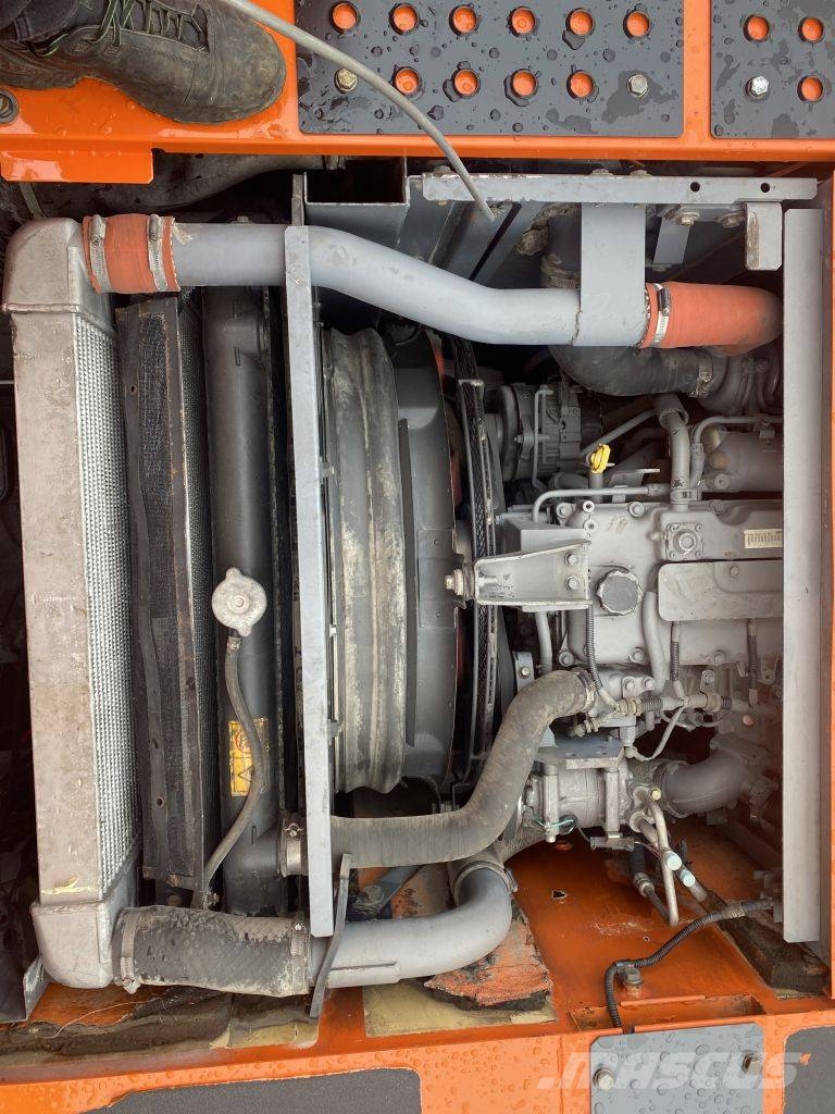Hitachi ZX 140 W-3 حفارات بعجل