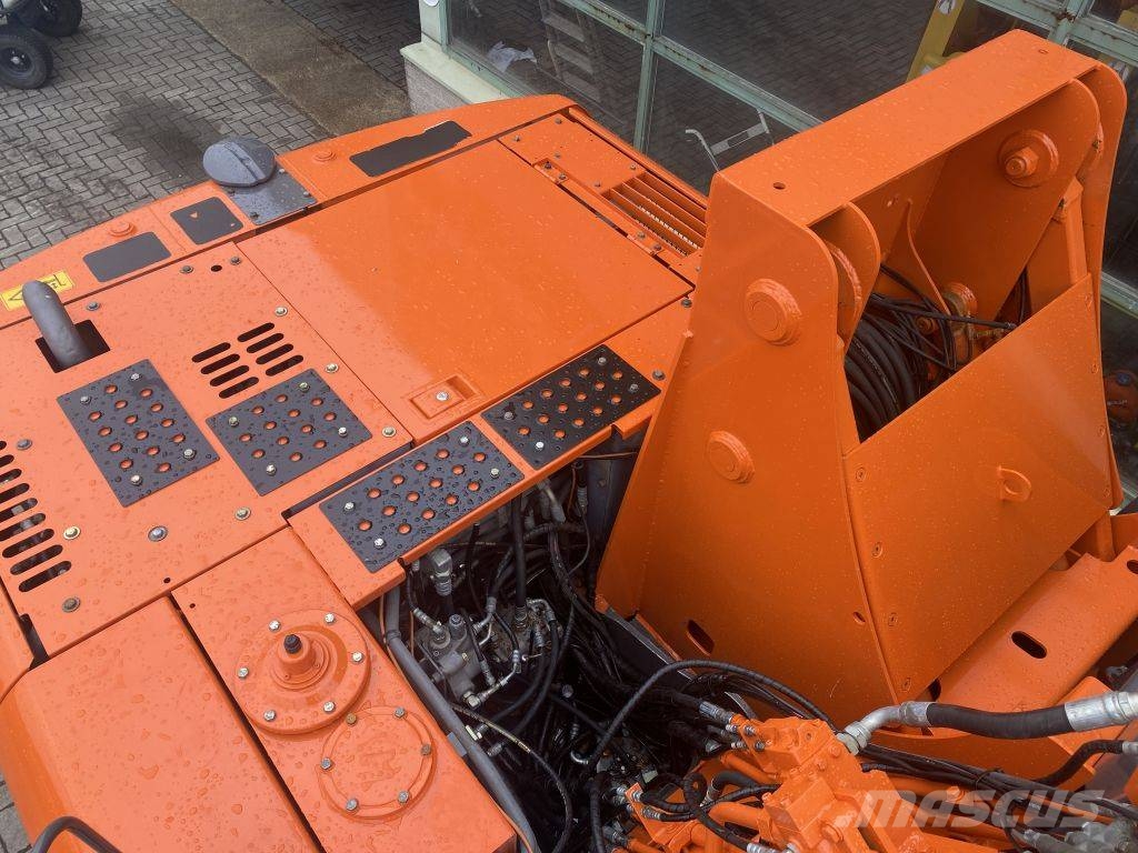 Hitachi ZX 140 W-3 حفارات بعجل