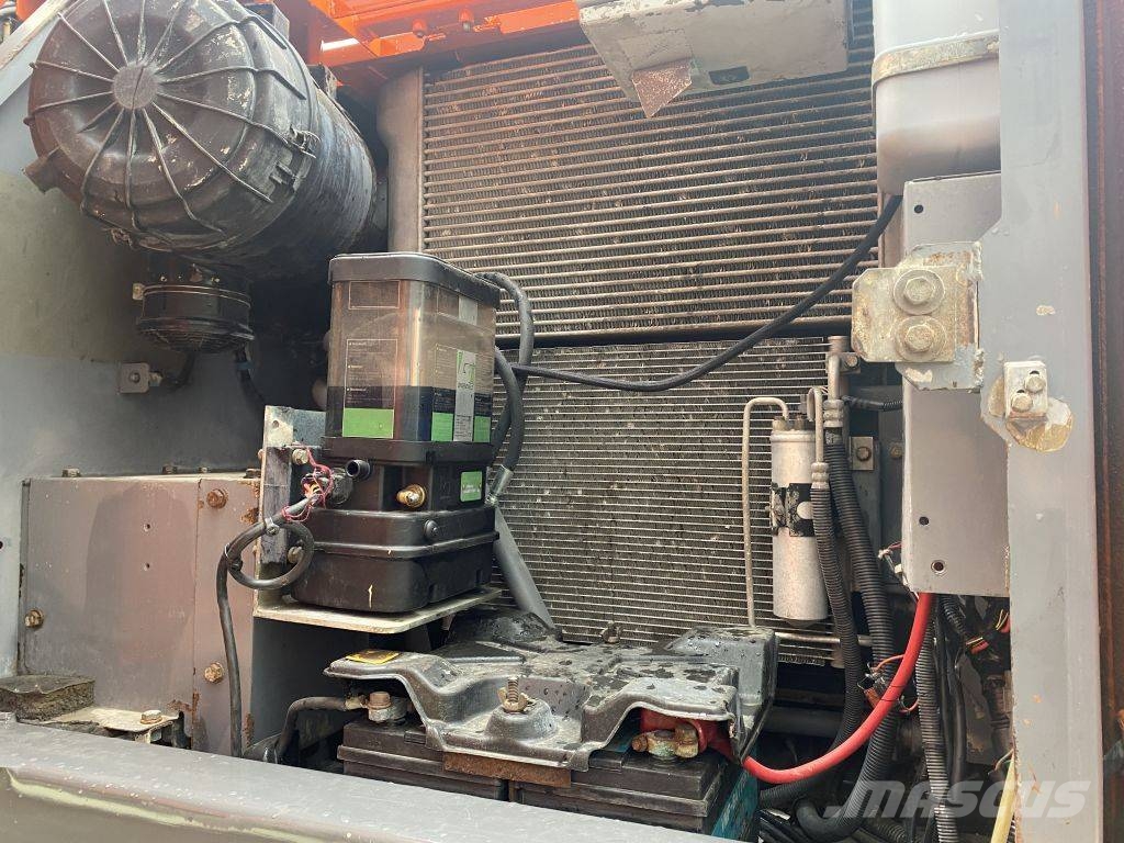 Hitachi ZX 140 W-3 حفارات بعجل