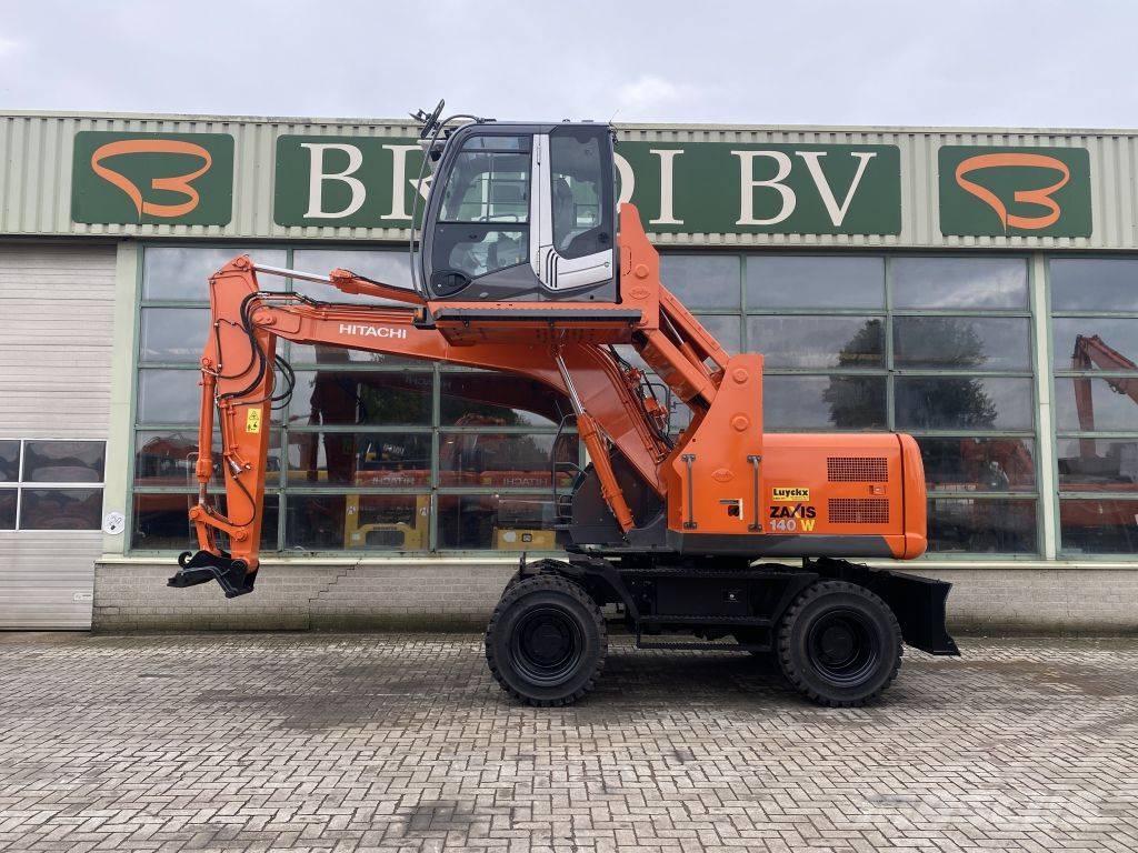 Hitachi ZX 140 W-3 حفارات بعجل