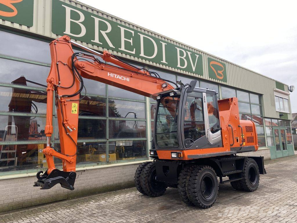 Hitachi ZX 140 W-3 حفارات بعجل