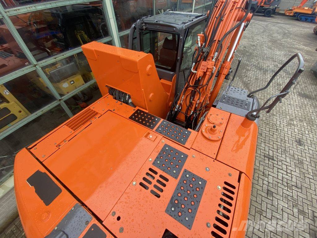Hitachi ZX 140 W-3 حفارات بعجل