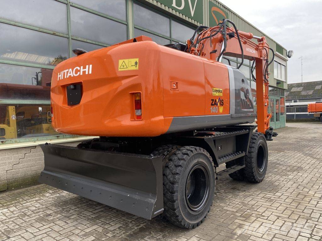 Hitachi ZX 140 W-3 حفارات بعجل