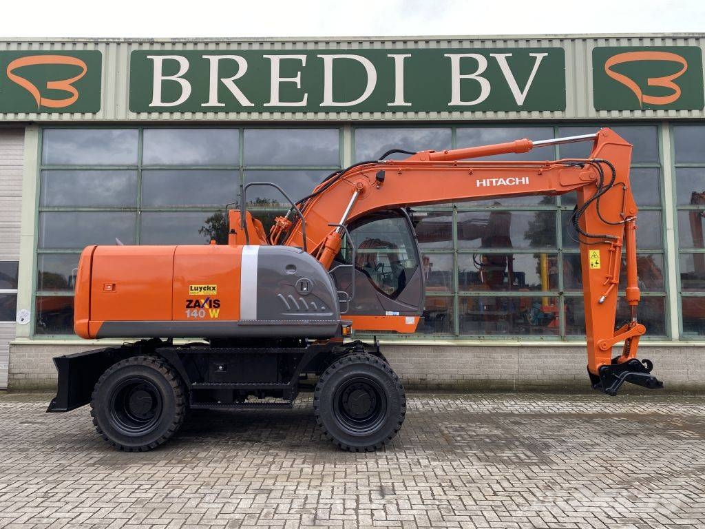 Hitachi ZX 140 W-3 حفارات بعجل