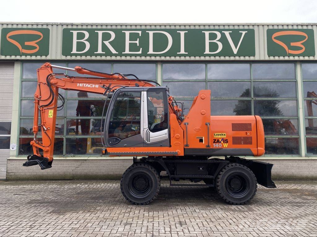 Hitachi ZX 140 W-3 حفارات بعجل