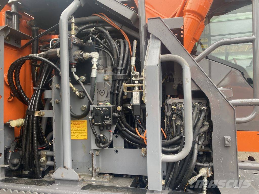 Hitachi ZX 140 W-3 حفارات بعجل