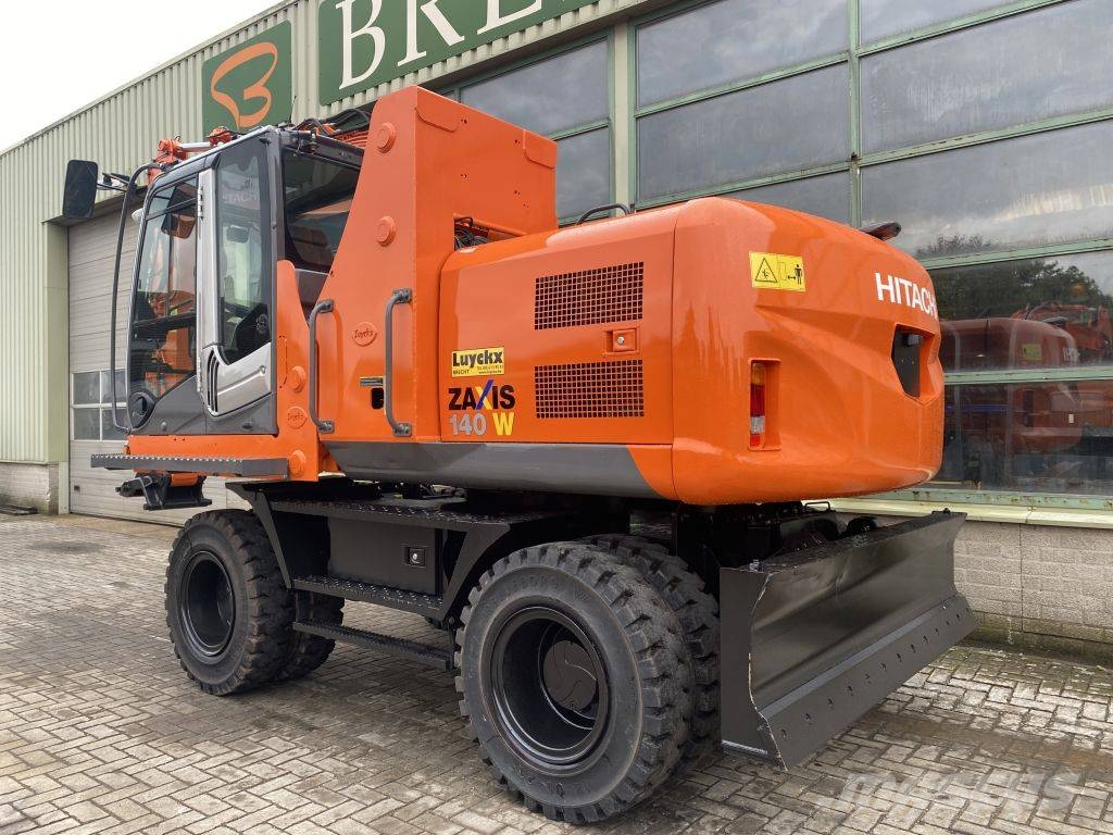 Hitachi ZX 140 W-3 حفارات بعجل
