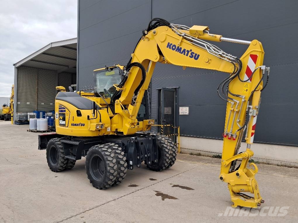 Komatsu PW98MR-11E0 Vidēja lieluma ekskavatori 7 t - 12 t