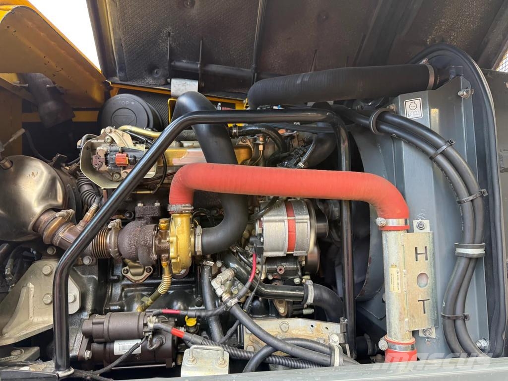Wacker Neuson EW100 حفارات بعجل