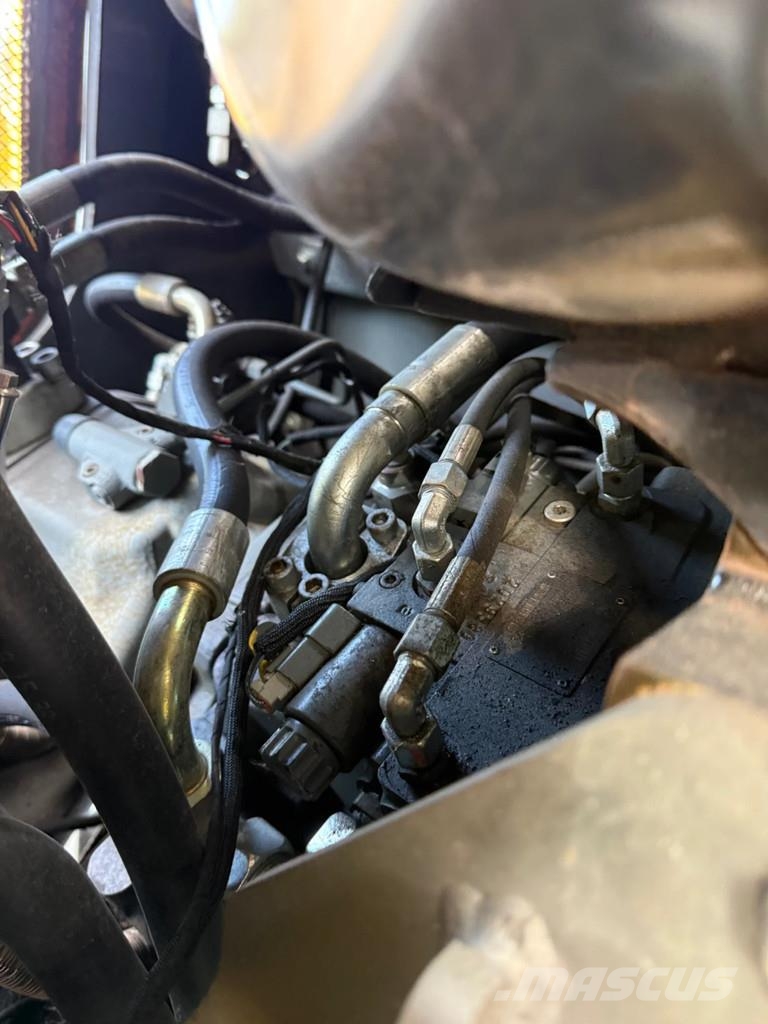 Wacker Neuson EW100 حفارات بعجل