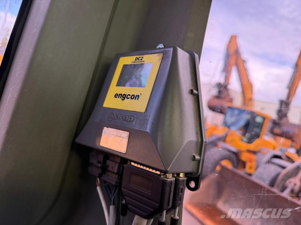 Wacker Neuson EW100 حفارات بعجل
