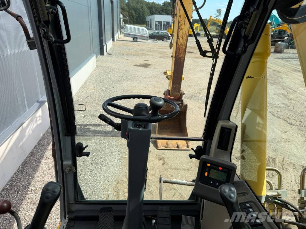 New Holland MH Plus Wielgraafmachines