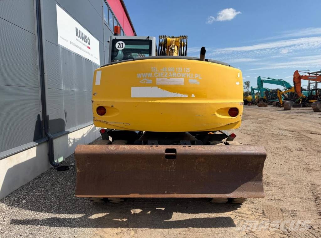 New Holland MH Plus Wielgraafmachines