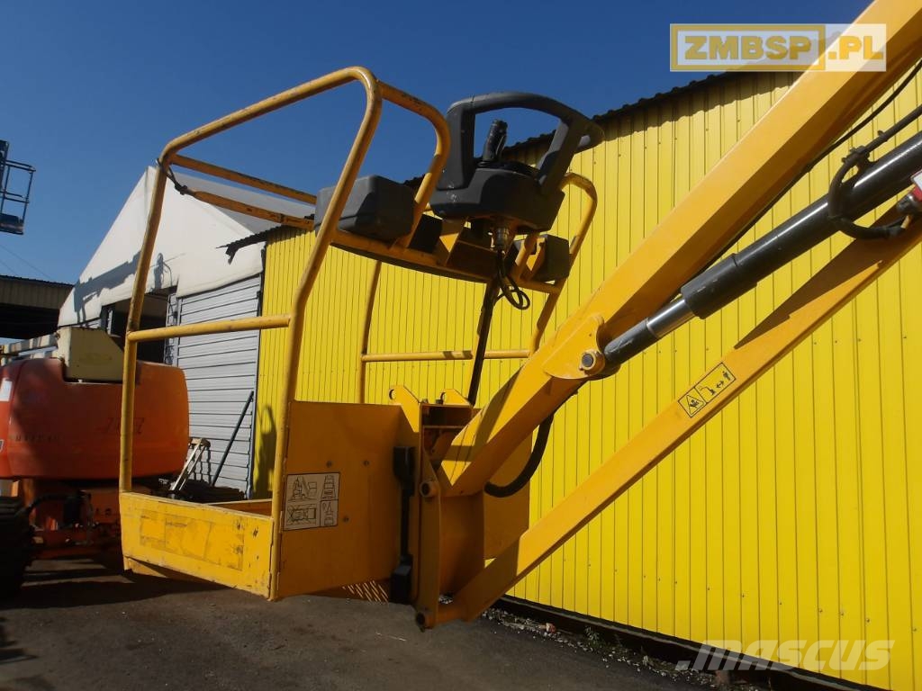 JLG Toucan 10 E Вертикальні щоглові підйомники