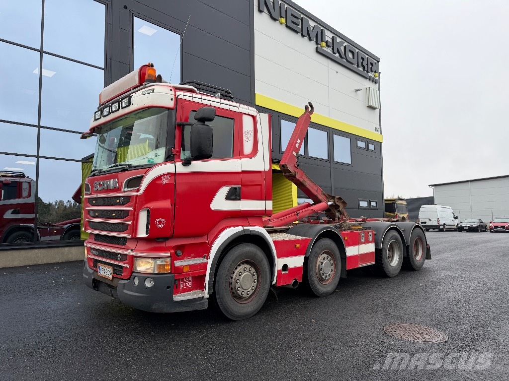 Scania R560 8x4/4 Rol kiper kamioni sa kukom za podizanje tereta