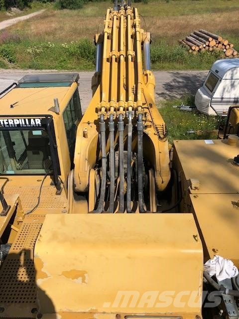 CAT 385 B Pásová rýpadla