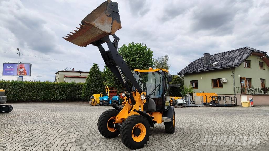 JCB 406 لوادر بعجل